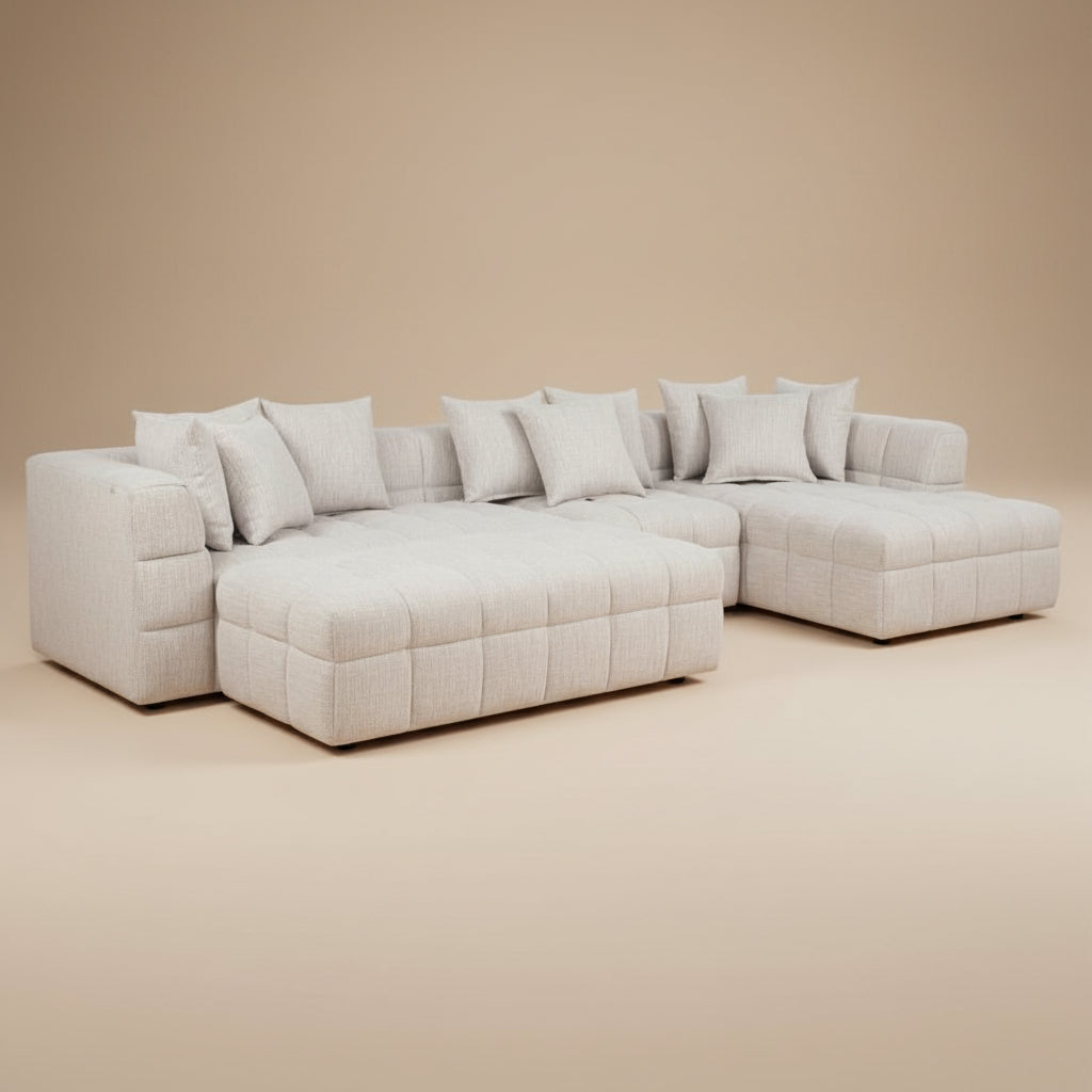 Beige sectional sofa on a white background