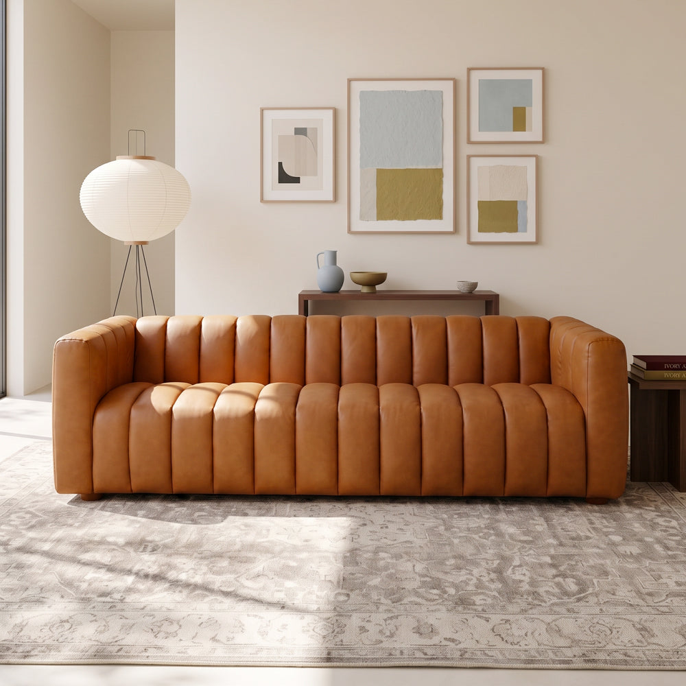Clara modern tan leather sofa with vertical channel tufting and small wooden feet | MidinMod