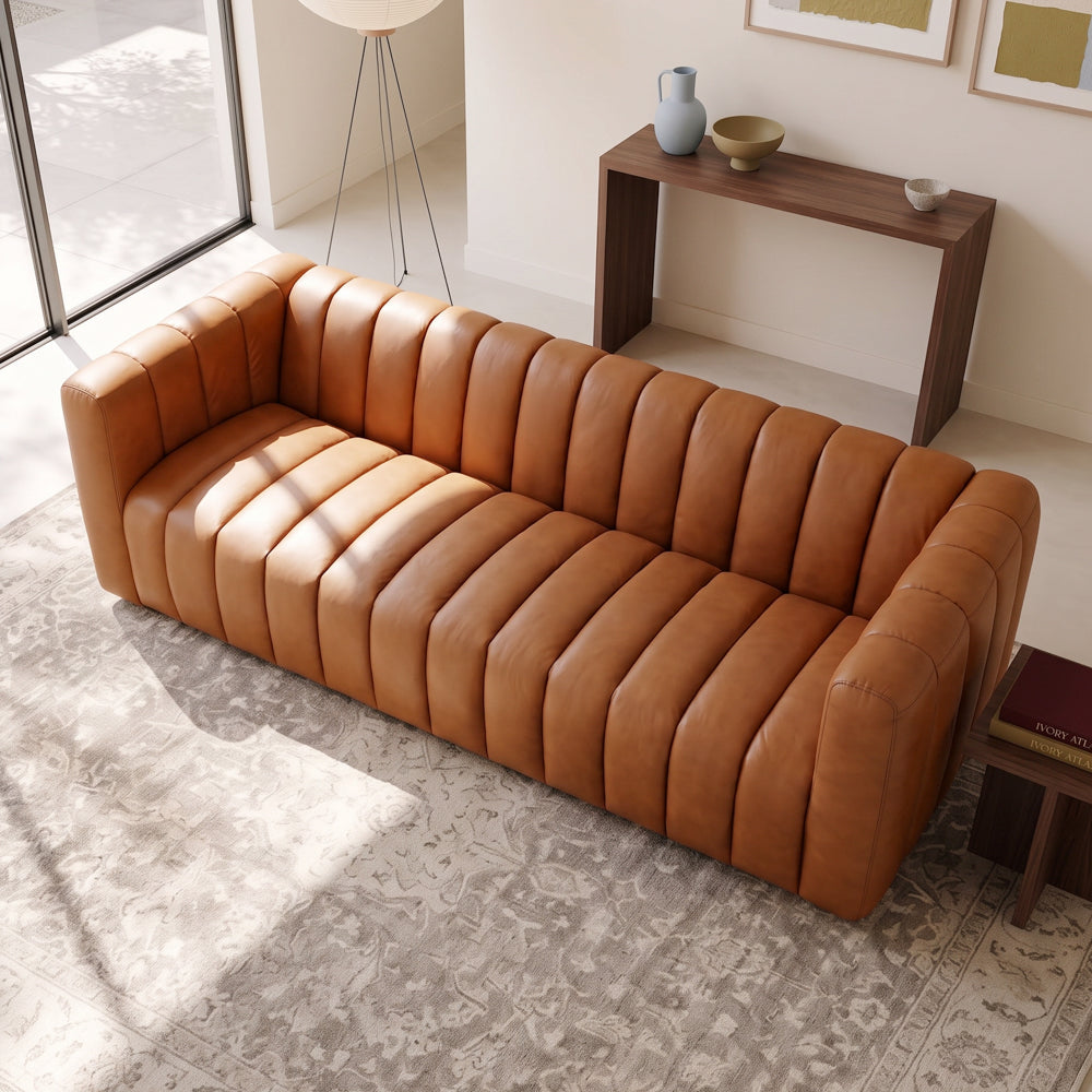 Clara modern tan leather sofa with vertical channel tufting and small wooden feet | MidinMod