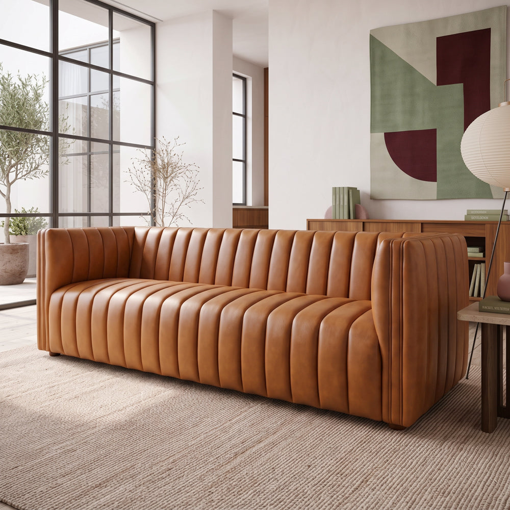 Rosslyn cognac leather sofa, cross clos-up view on a lifestyle studio | MidinMod
