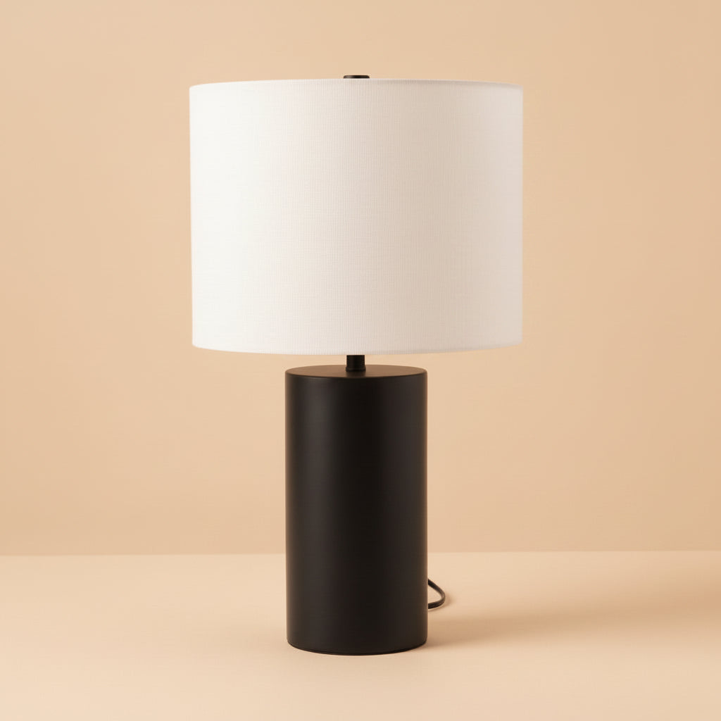Black cylindrical Table Lamp with white drum shade on a plain white background, front view
