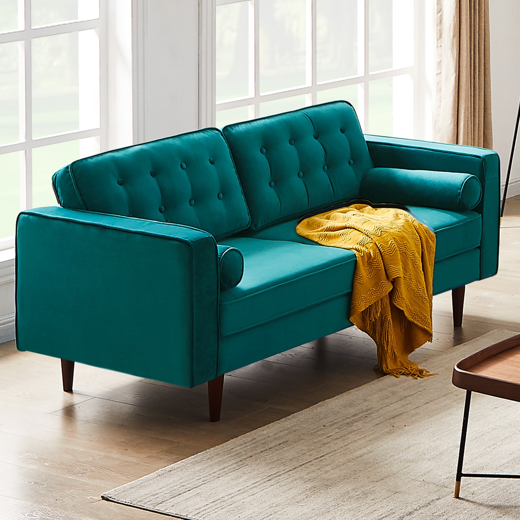 Teal leather store loveseat